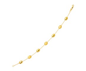 Polished and Textured Pebble Station Bracelet in 14k Yellow Gold