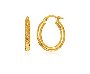 14k Yellow Gold Diamond Cut Textured Oval Hoop Earrings.